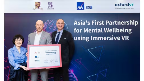 man walking in front of textured wall